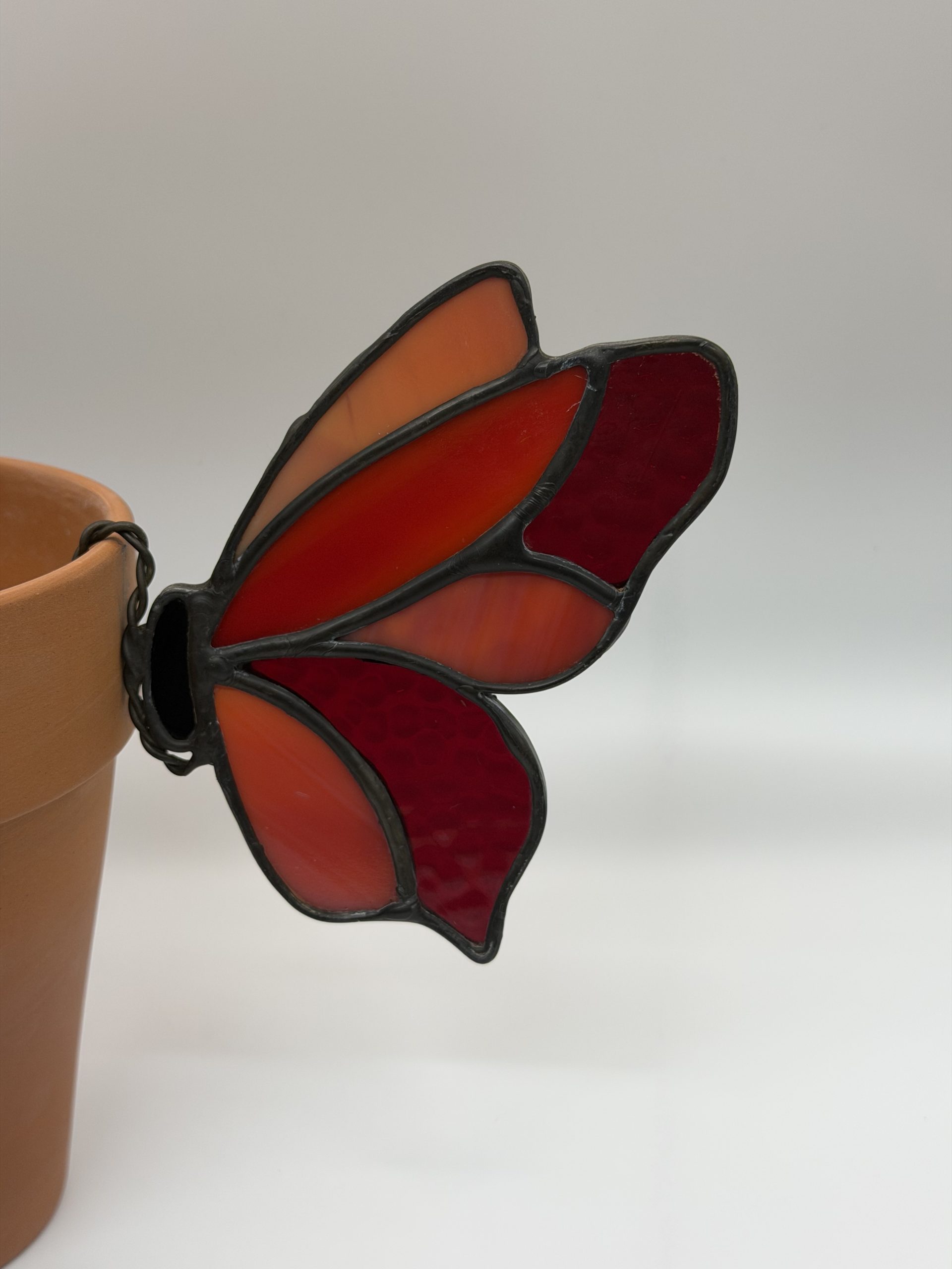 Red stained glass butterfly planter buddy