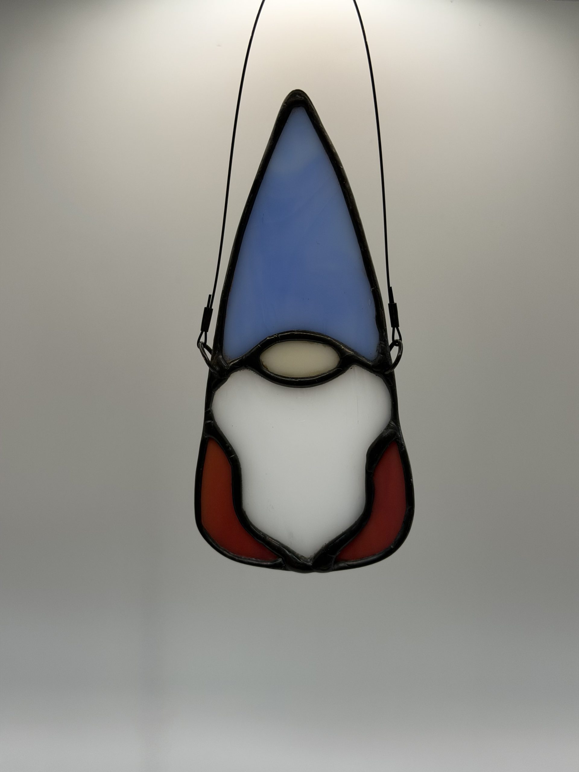 red, white, and blue gnome stained glass sun catcher