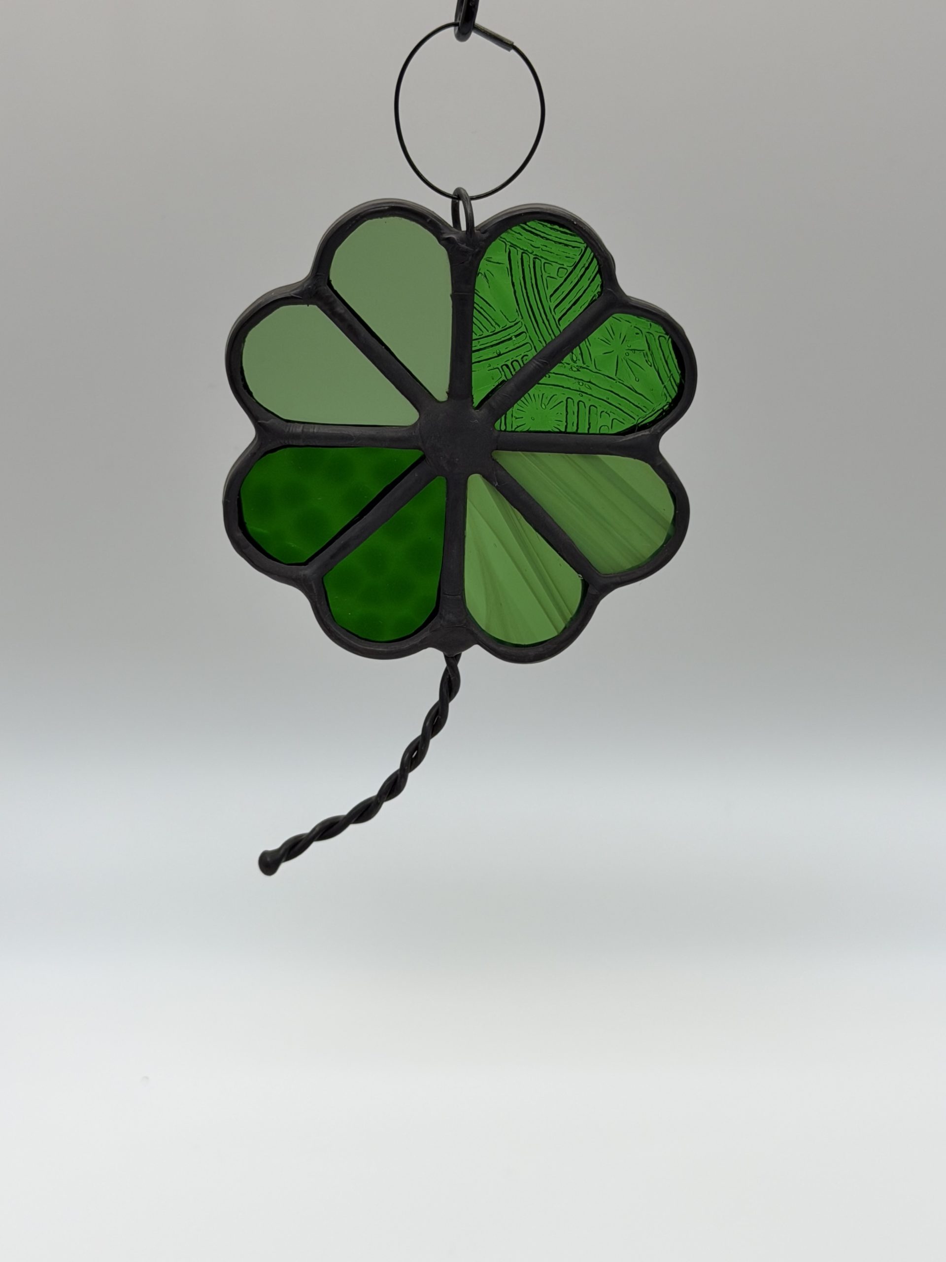 green stained glass four leaf clover